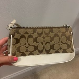 Coach purse in good condition. Shows minor wear.